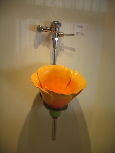 Yep, urinals designed as flowers to piss in